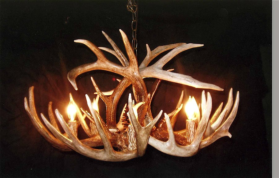 Antler lamps, chandeliers, and rawhide shades for sale.  These are the same quality as seen in high priced cabin decor stores.